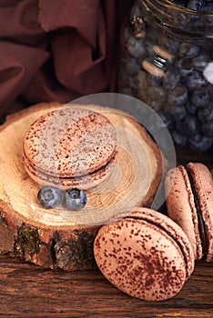 chocolate sweet macaroni with blueberry berries. delicious and tasty dessert for coffee