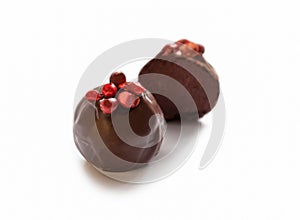 Chocolate sweets with red peper