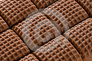 Chocolate toffee bar with checkered texture close-up