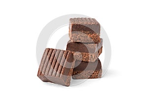 Chocolate toffees isolated on white.