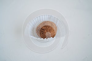 Chocolate truffle candy at white background