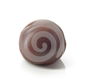 Chocolate truffle on a white background