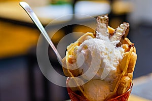 Chocolate and vanilla ice cream in waffle cones