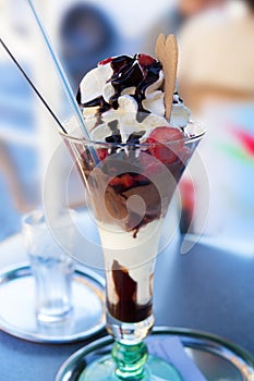 Chocolate vanilla strawberry sundae photo