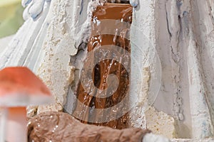 Chocolate waterfall. Close up look.