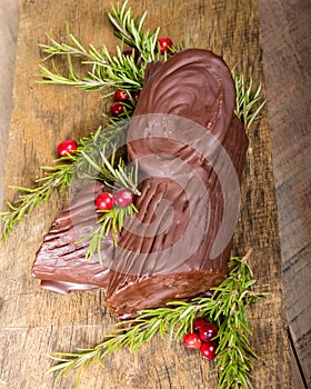 Chocolate Yule log with cranberries