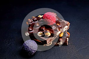 Chocolates background. Chocolate. Assortment of fine chocolates in white, dark, and milk chocolate. Praline Chocolate