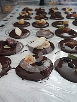 Chocolates with dryfruits making background