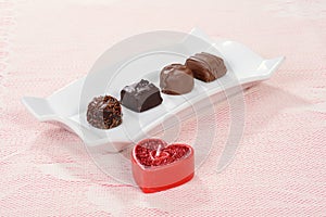 Chocolates with heart candle