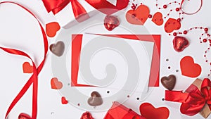 Chocolates, love letter envelope, gift box on white background . Valentine`s day celebration concept. Copy space. Flat lay