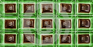 Chocolates pralines in green box