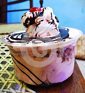 chocolaty cup cake with cool background photo