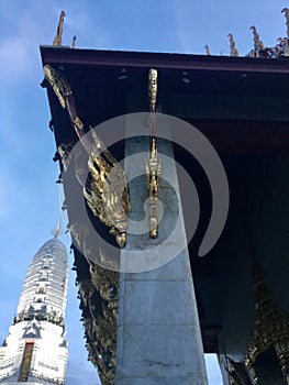 Chofah on Thai temple roof photo