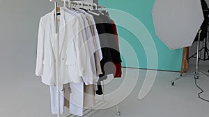 A choice of clothes on a rack. Wardrobe rack with stylish clothes