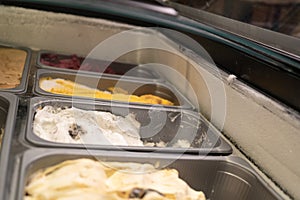 Choice of ice cream. Italian gelateria. Ice-cream on showcase in cafe