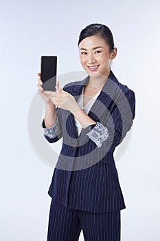 Choice it! Technology, mobile, equipment for communication. Young beautiful woman shows right in camera the blank screen of smart