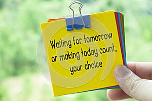 Choice about tomorrow text on sticky notes with bright nature background