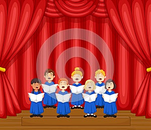 Choir children singing a song on the stage