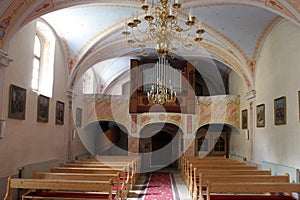 Choir with organ in the Church of the St Brice of Tours in Brckovljani, Croatia photo