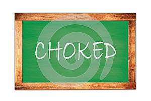 CHOKED text written on green school board photo