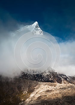 Cholatse 6335 m peak hidden in clouds