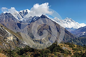 Cholatse, Nuptse, Everest, Lhotse mountaind and small Phortse Tanga views photo