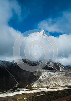 Cholatse summit 6335 m hidden in clouds