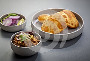 Chole bhature served in a plate