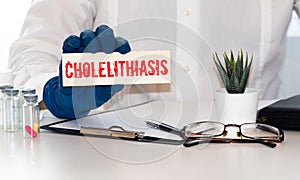 Cholelithiasis word, medical term word with medical concepts in blackboard and medical equipment photo