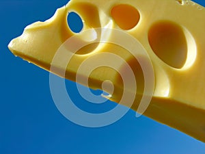 Cholesterol attack. Conceptual image of cheese