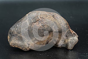 Chondrite Meteorite isolated, piece of rock formed as an asteroid in the universe at during Solar System creation. The meteorite