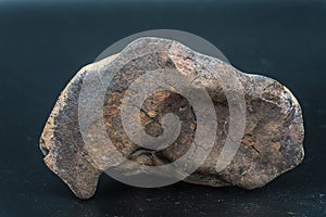 Chondrite Meteorite isolated, piece of rock formed as an asteroid in the universe at during Solar System creation. The meteorite