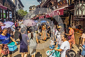 CHONGQING, CHINA - AUGUST 17, 2018: Crowded street in Ciqikou Ancient Town, Chi