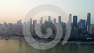 Chongqing skyscrapers next to the Yangtze river and sunset on the background, Chinese megapolis, Urban Skyline landscape vie