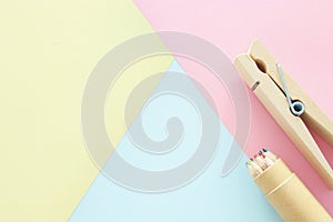 chool or office supplies, back to school over pastel background template.