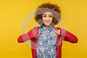 Choose me, I`m best! Portrait of happy cheerful woman pointing herself, boasting and enjoying own success