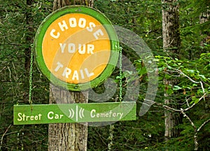 Choose Your Trail sign in Skagway, Alaska at Gold Rush Cemetery