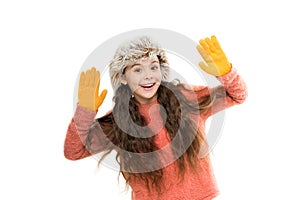 Choose your winter. small girl earflap hat and gloves. her favorite knitted sweater. active healthy childhood. winter