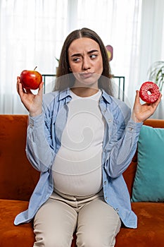 Choosing right nutrition pregnant woman comparing choosing between sweet donut and ripe apple