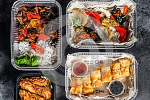 Choosing take away food. Spring rolls, dumplings, gyoza and dessert in lunch box. Take and go organic food. Thai and Asian