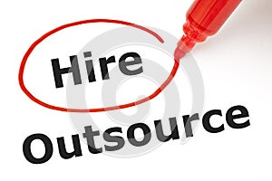 Hire or Outsource with Red Marker photo