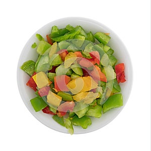 Chopped bell peppers in a small white bowl