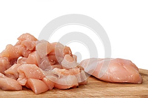 Chopped chicken white meat on the wooden board