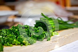 Chopped Chives on Breadboard in the Kitchen