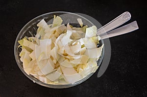 Chopped endive with apple pieces