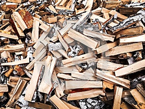 Chopped firewood piled mountain