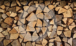 Chopped firewood woodpile close-up background