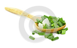 Chopped fresh green onions isolated on white background. Top vie