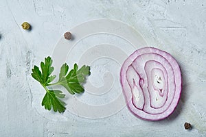 Chopped onion, red hot pepper and spice isolated on white background, top view, close-up, selective focus photo