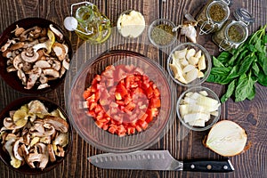 Chopped Plum Tomatoes in a Glass Mixing Bowl